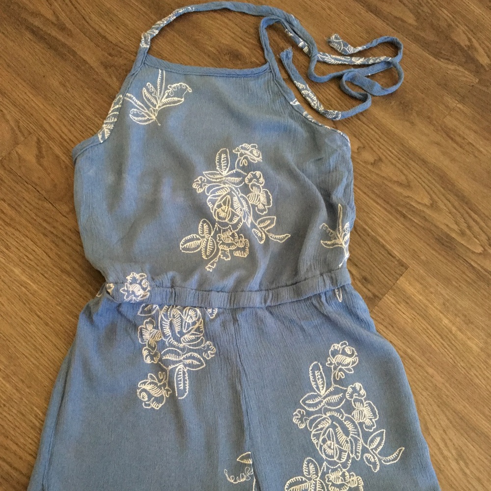 Warn once. Super cute little girls romper. Size XS